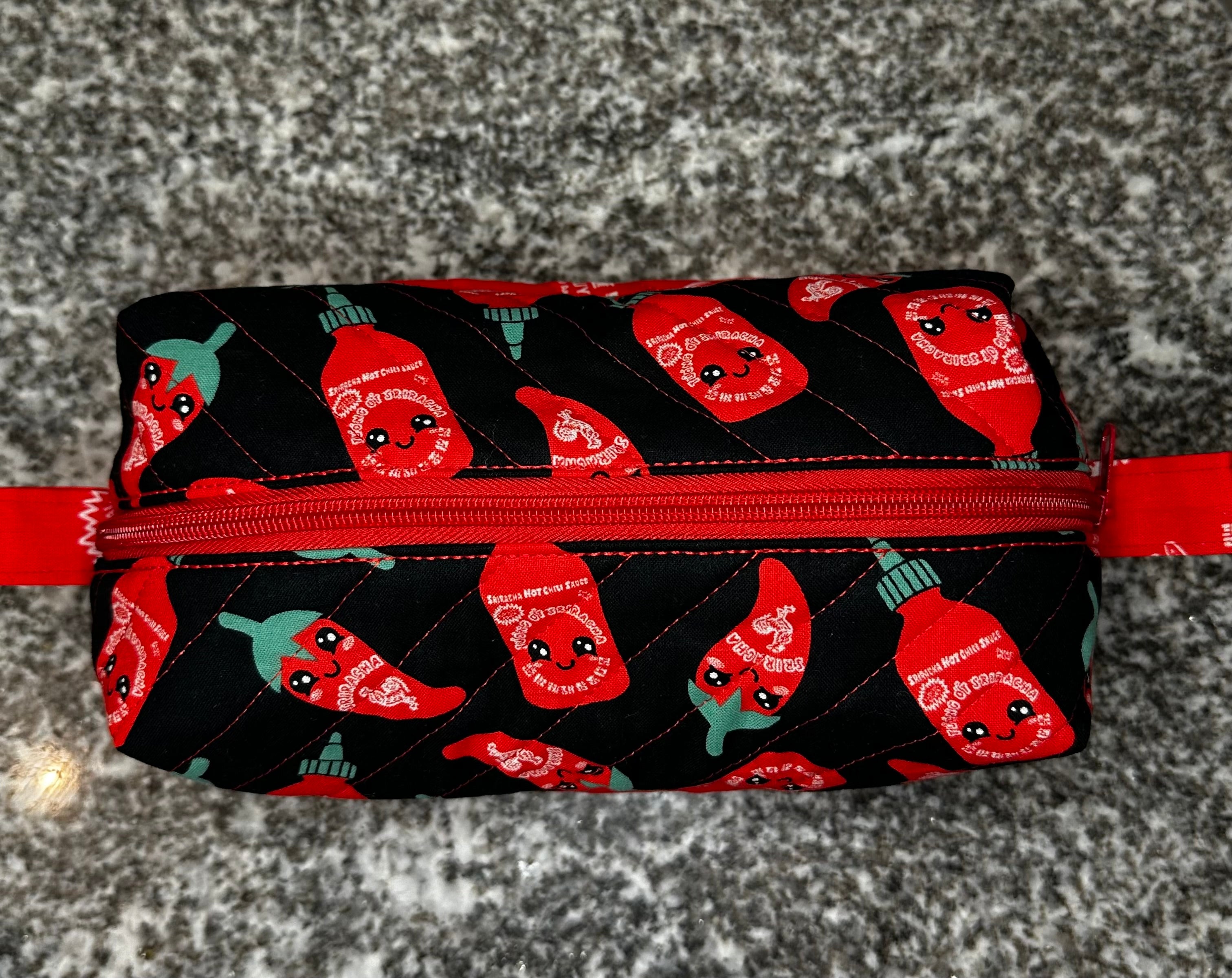 Quilted fabric cosmetic bag