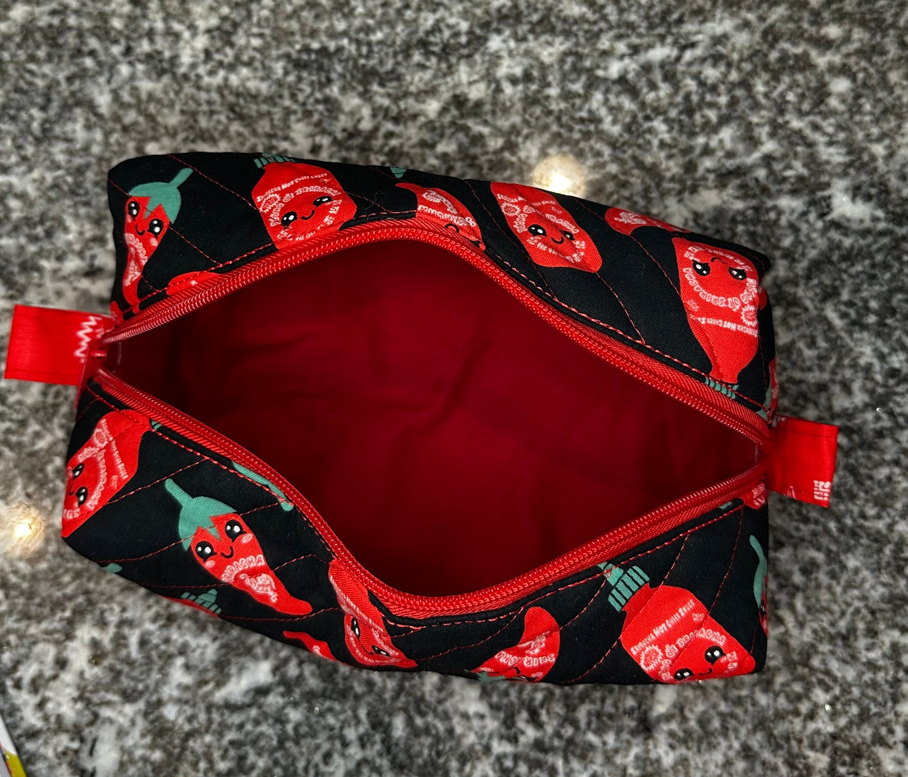 Quilted fabric cosmetic bag