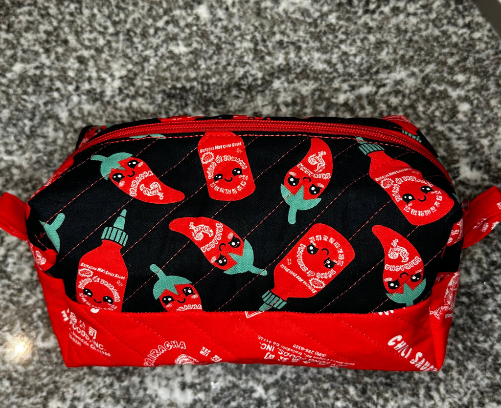 Quilted fabric cosmetic bag